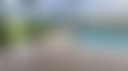 Update Your Paradise with Our Improved Pool Deck Coating System!