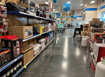For Camping World, we used the Tru-Flow Metallic Quicksilver blend to deliver a sleek, high-end look with a reflective, modern finish. This luxurious flooring solution combines aesthetic appeal with robust durability, perfect for a high-traffic retail environment.