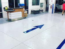 kia center lakeland solid pearl white epoxy with blue guidelines