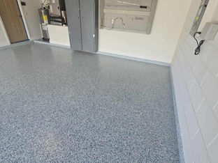 sea glass garage flooring with items on wall