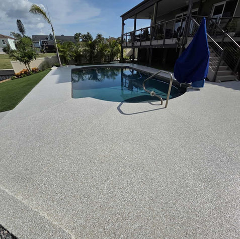 White Swan Flake Blend Pool Deck Coatings in Central Florida with Lanai Section for Sunbathing