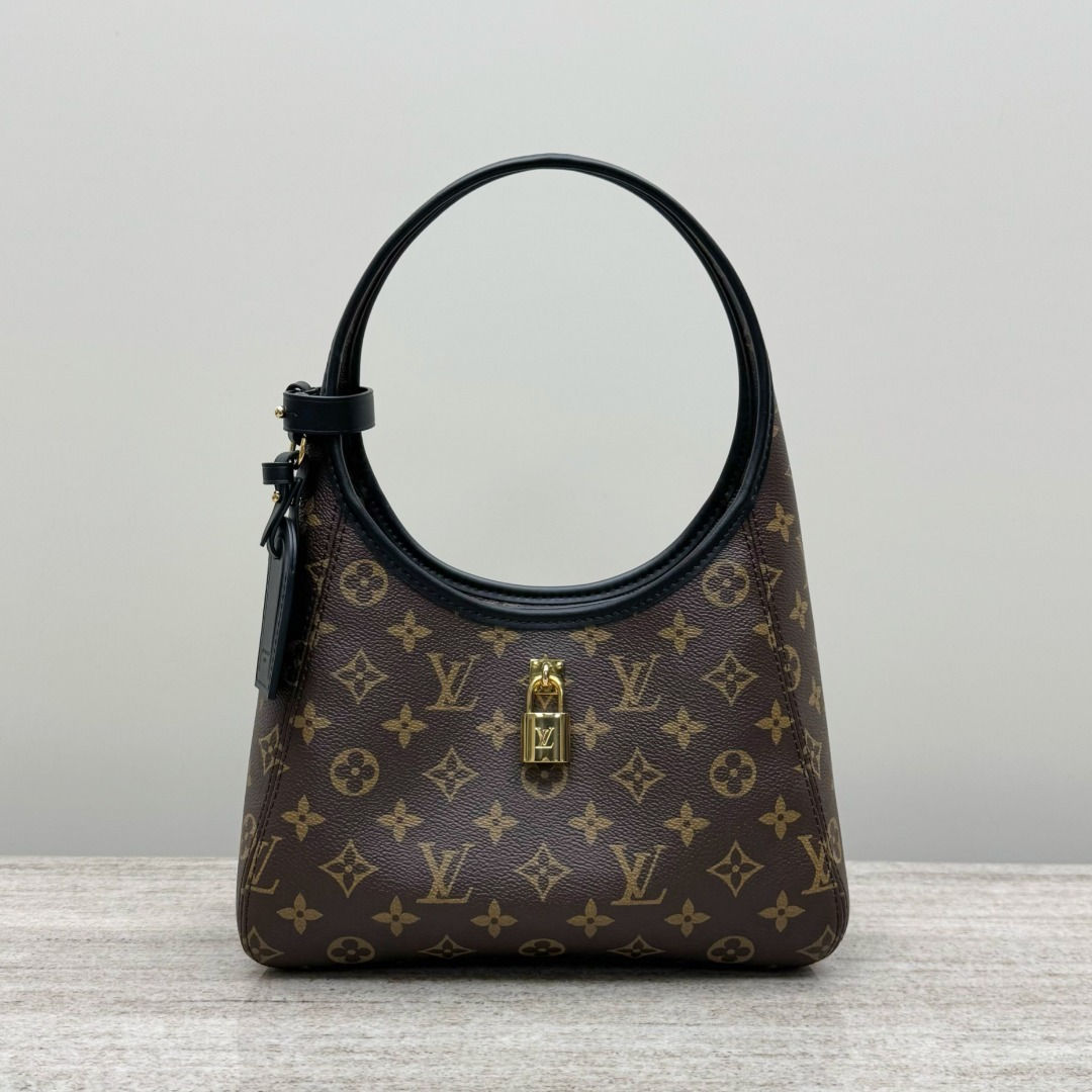 Louis Vuitton The Drop Handbag Brown