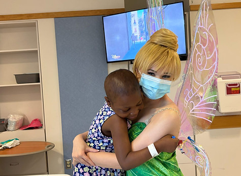 Tinkerbell hugging photo.jpeg