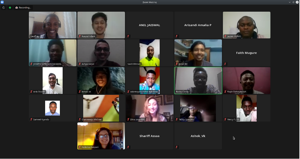 Screenshot of Zoom meeting call with 18 diverse males and females appearing on video.