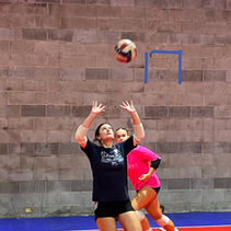 Volleyball players working on their skills in the Storm Training Center.