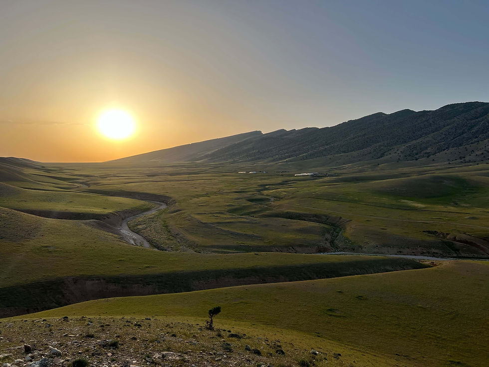 sunset over hills.jpg