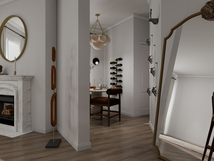 Apartment model staging highlighting the transition from living room to dining area with curated furnishings, sculptural lighting, layered neutral finishes, and art-forward styling designed for modern multifamily living.