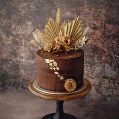 Naked cake chocolat fleurs séchées.jpeg