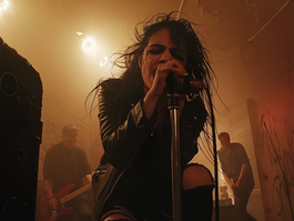 Isla in a black leather jacket sings her track - "Polished Vomit Polished" at the metro theater in Sydney. Intense mood. PixelStortion