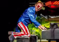 Kenny Metcalf as Elton
