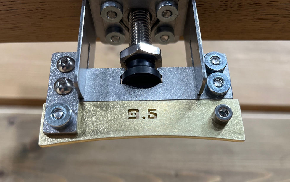 Close up view of caul retaining method