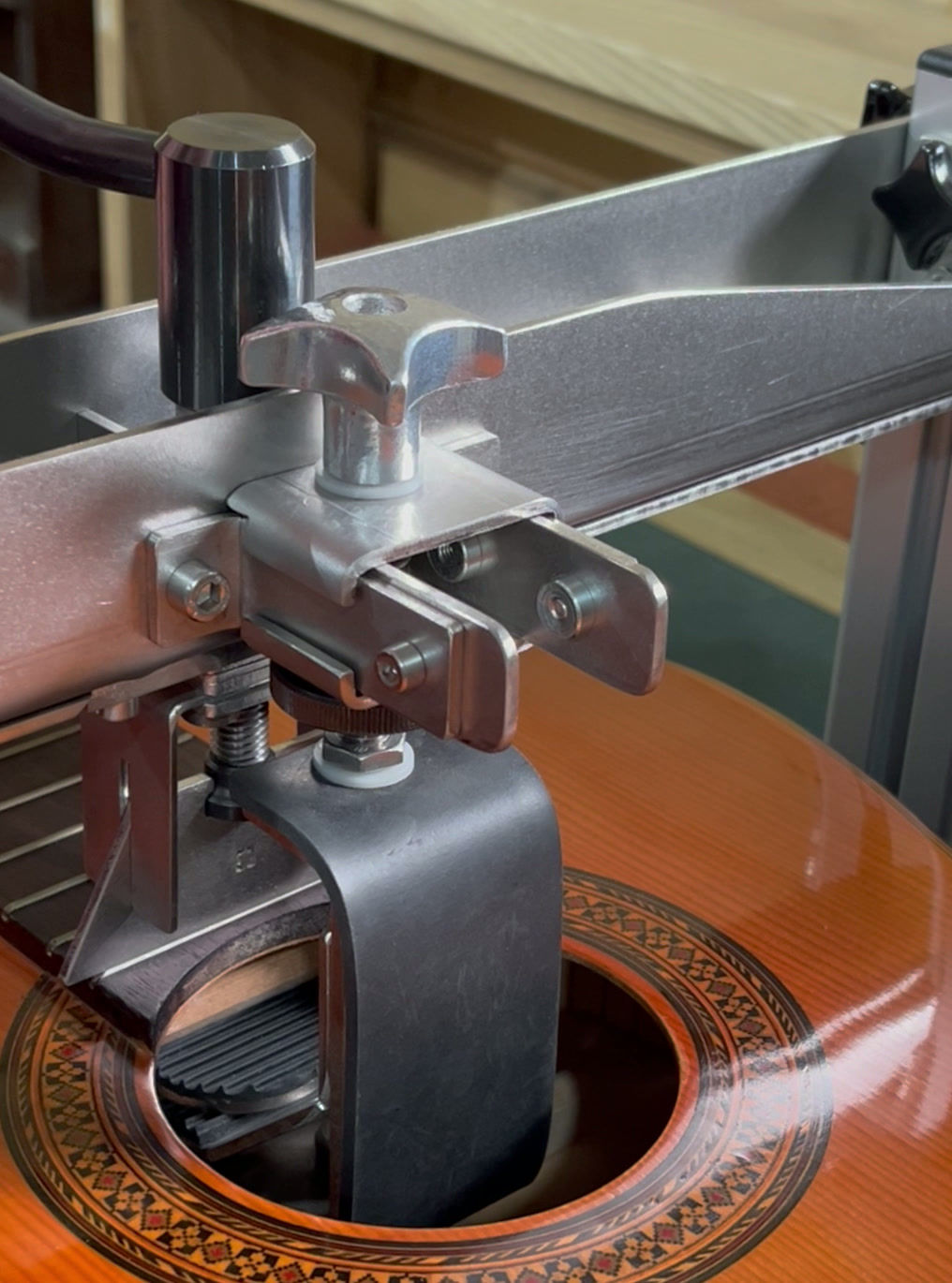 Video showing fret pressing over the soundboard