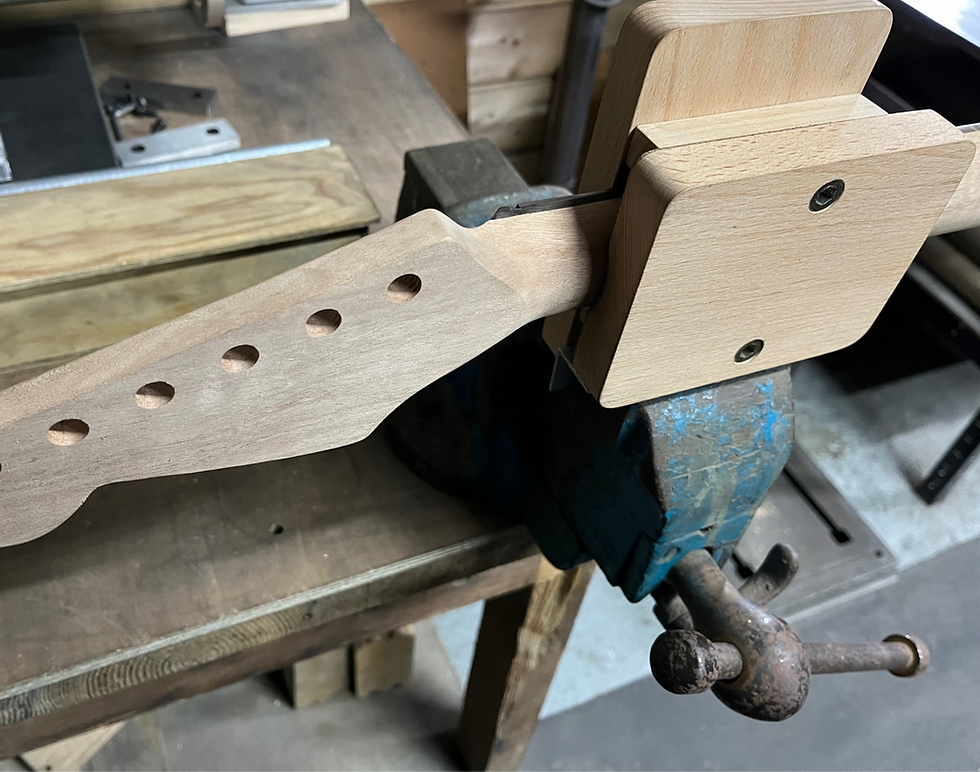 Safely clamping a guitar neck