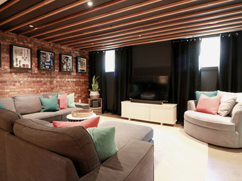 Modern basement with brick wall