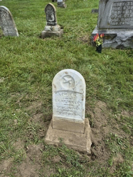 Child's marble gravestone, 'A Child of J. & M. S.', Cemetery