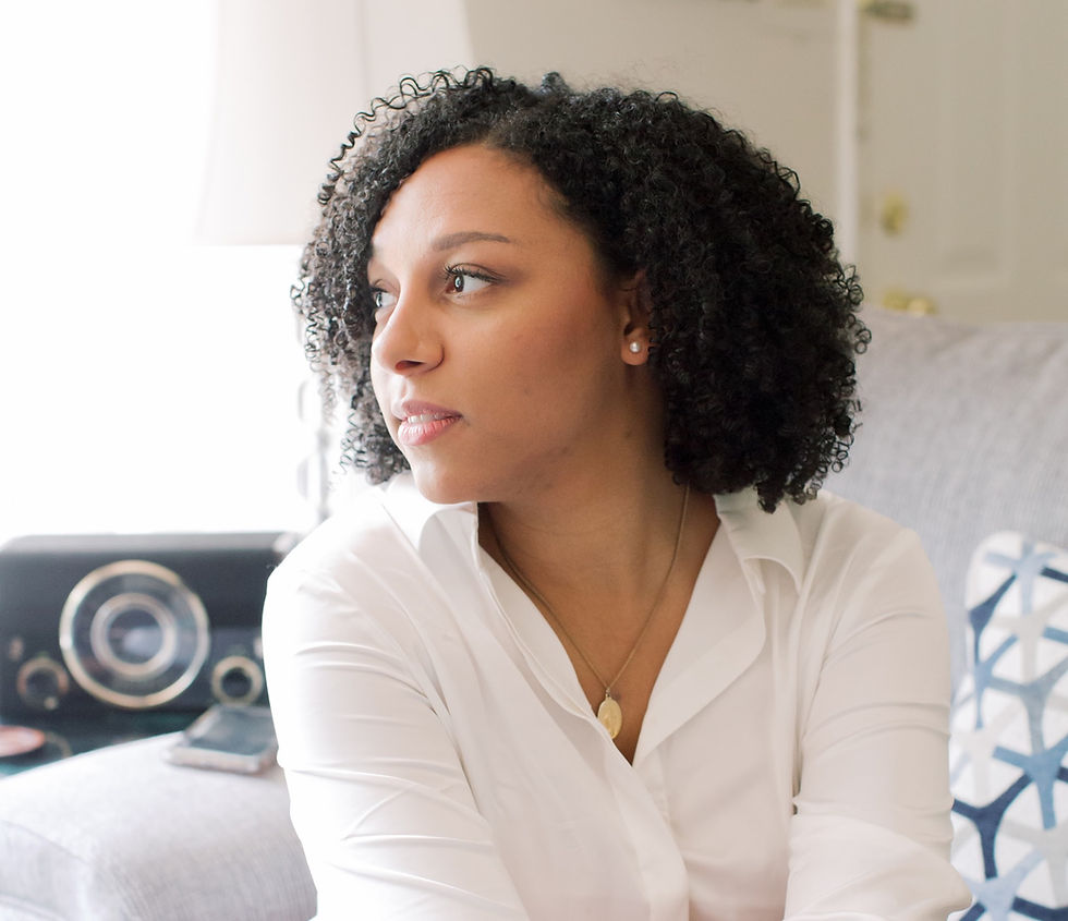 Grieving mother looking off to the side.