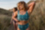 Thumbnail: woman modelling bikini in sand dunes front view