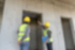 Elevator technicians conducting an inspection.