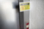 Elevator out of service sign posted on elevator doors, highlighting the need for immediate elevator servicing.