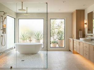 Luxury spa bathroom remodel in Orange County featuring a freestanding soaking tub, curbless steam shower, and white oak floating vanity.