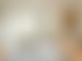 Luxury spa bathroom remodel in Orange County featuring a freestanding soaking tub, curbless steam shower, and white oak floating vanity.