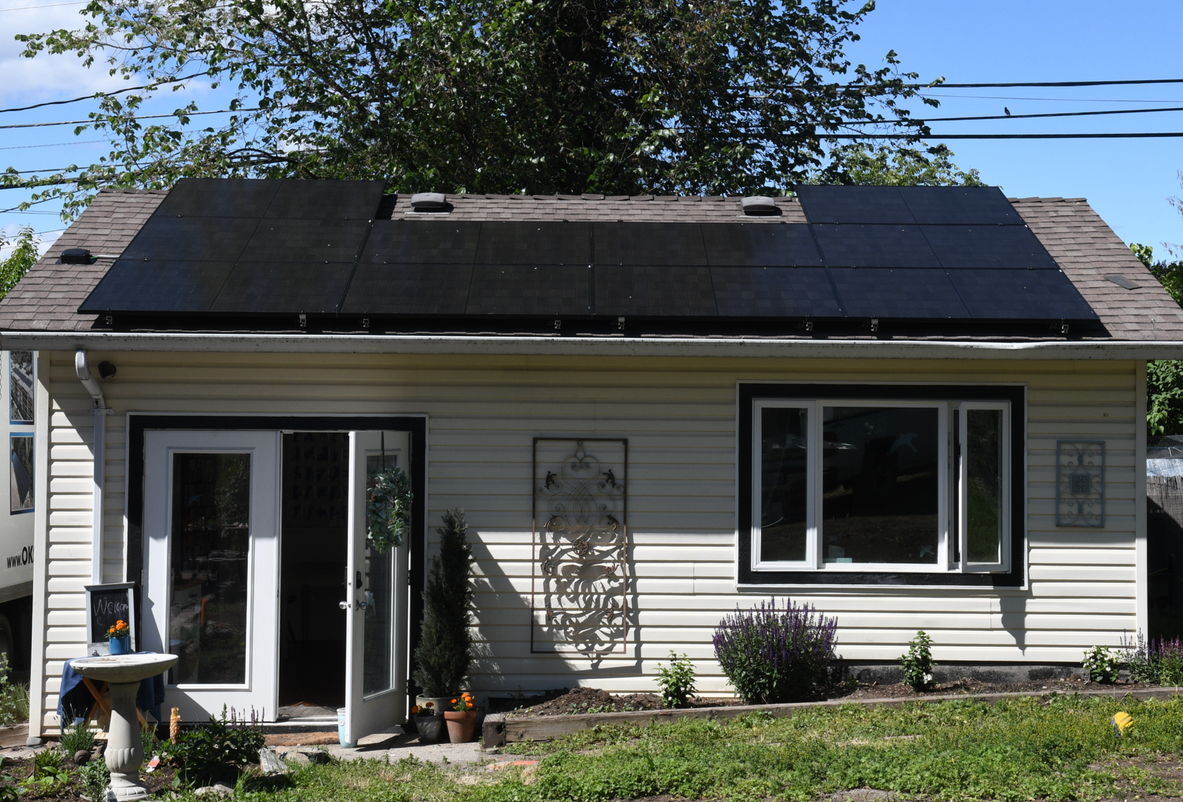 Solar on roof of a white house