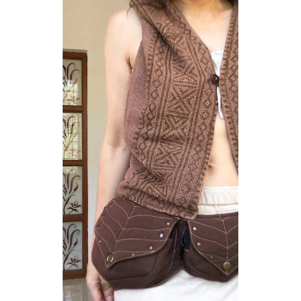 Close-up of cotton waistcoat worn facing front