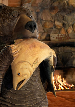 Bear biting fish closeup inside.jpg