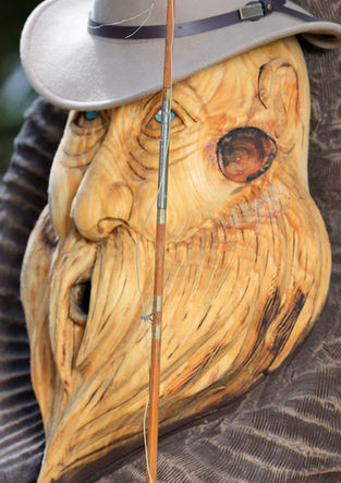 Chainsaw Carving - Alaskan Brown Bears with Salmon and Unlucky Fisherman. Comes complete with gorgeous curly Cherry Live-edge Bar-top.
