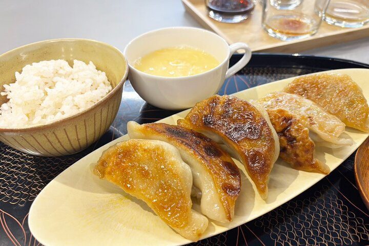 A Japanese gyoza set meal made during a hands-on cooking experience at Patia in Tokyo