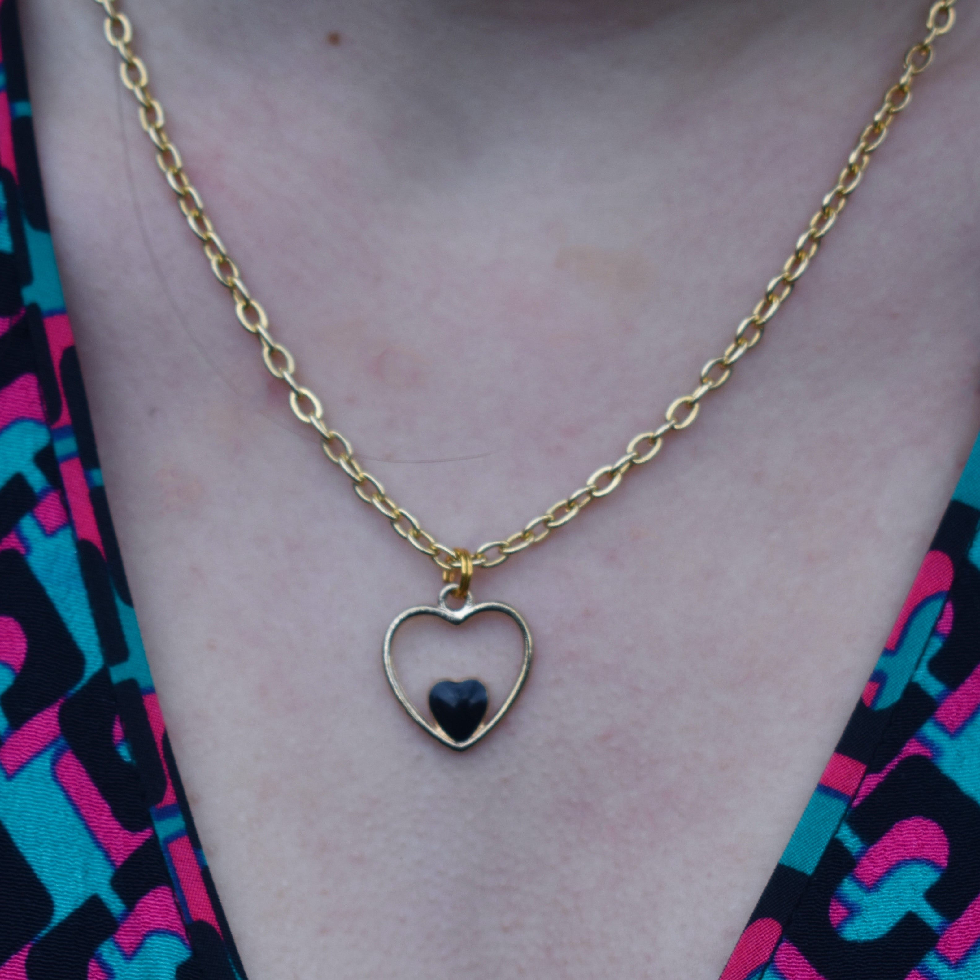 Black heart enamel pendant necklace on 18 inch gold plated chain | by Ifemi Jewe