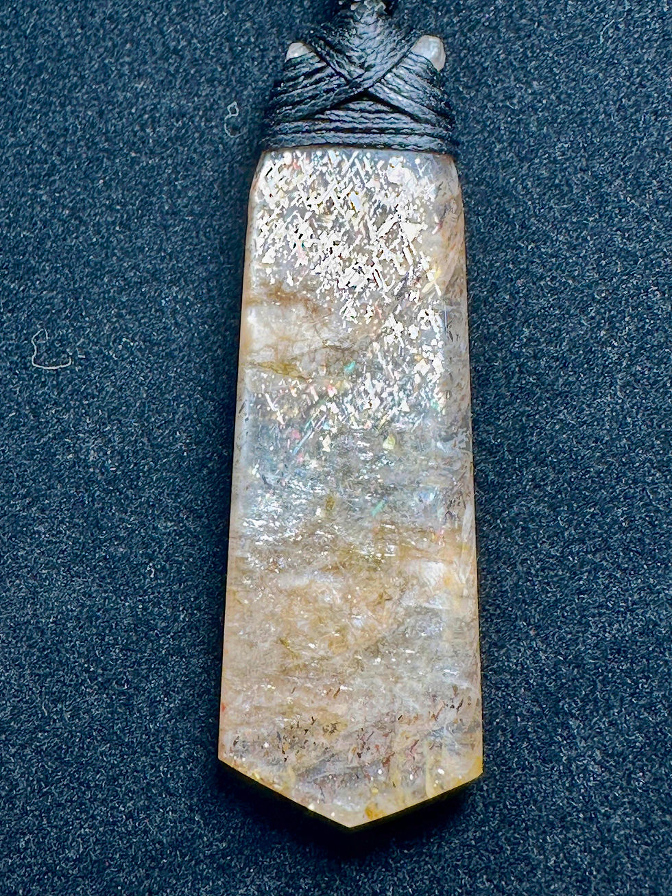 Thumbnail: Rainbow Lattice sunstone Māori style pendant