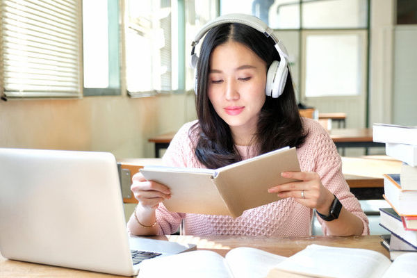 young-woman-listenining-to-music.jpg