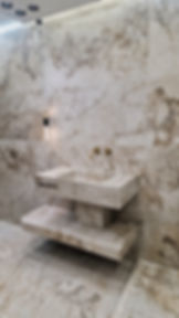 Bespoke stone washbasin with stepped design