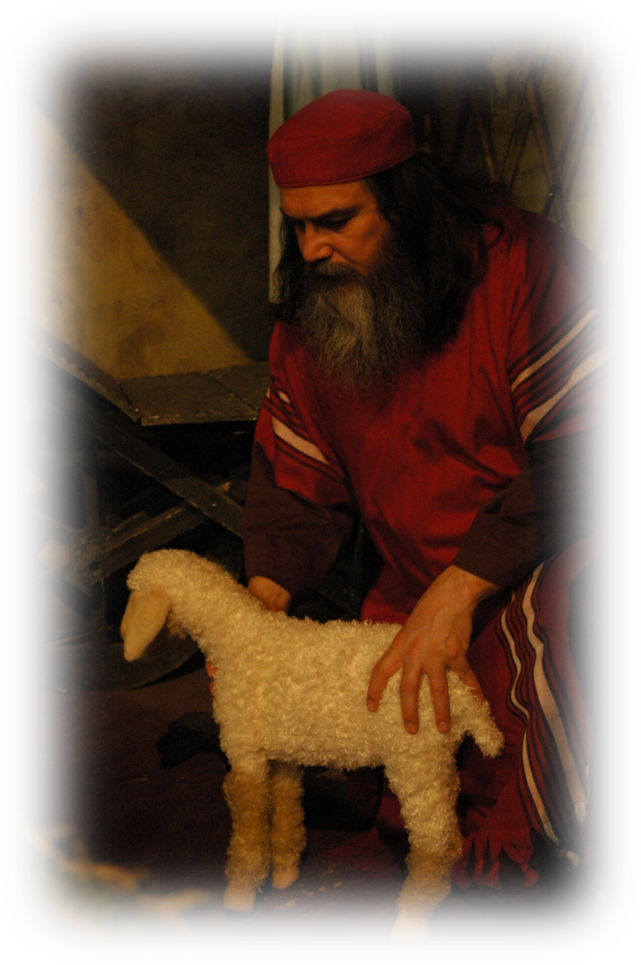 The father inspecting the Passover lamb