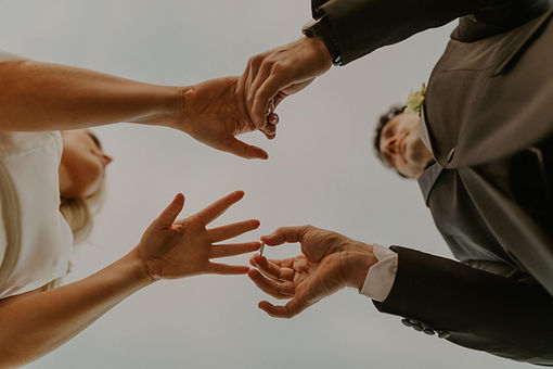 couple exchanging rings
