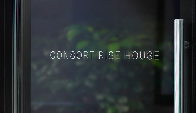 consort rise house vinyl entrance door signage designed to convey a sense of luxury with a minimal design approach.