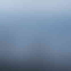 Man running into the ocean