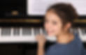 Kid piano smiling.jpg