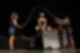 team-jumping-on-stage.webp