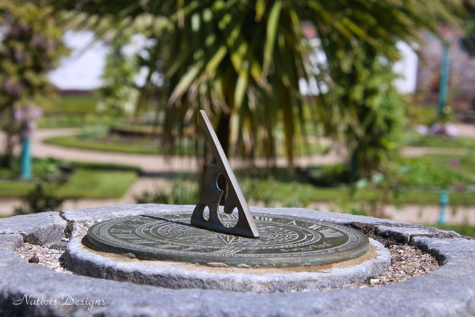 Sundial within the walled Victorian Walled Gardens in Kylemore Abby in Galway Ireland