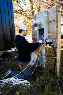 Nick Hood working on an electrical project