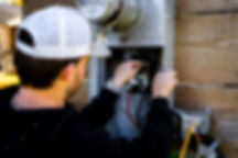 Nick Hood working on an electrical meter box