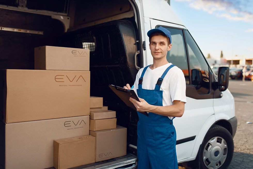 deliveryman-in-uniform-carton-boxes-in-the-car-2023-11-27-05-14-31-utc
