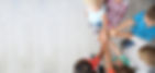 Little children putting their hands together indoors, top view_edited.jpg