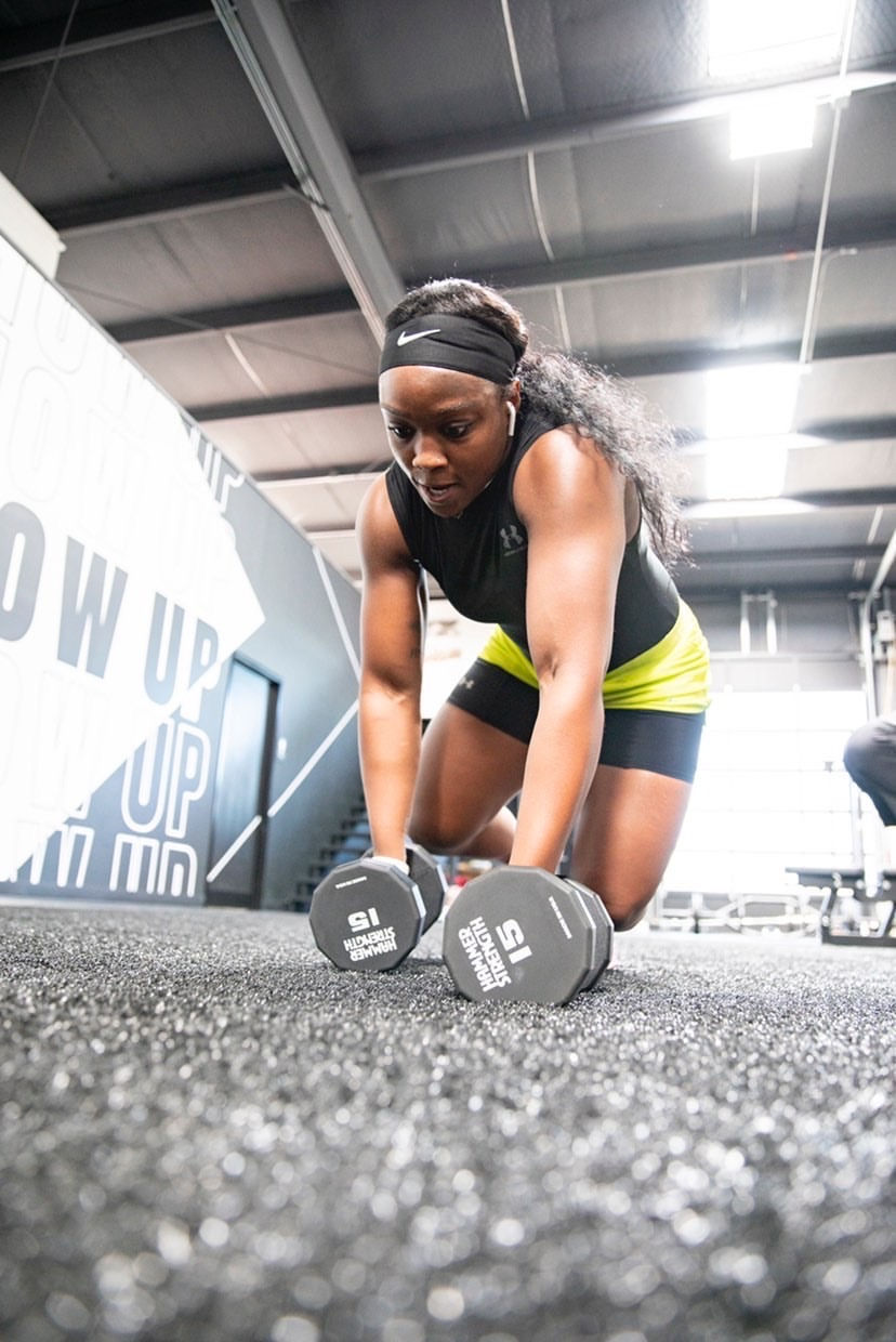 Image of Dominique Edomwande lifting weights