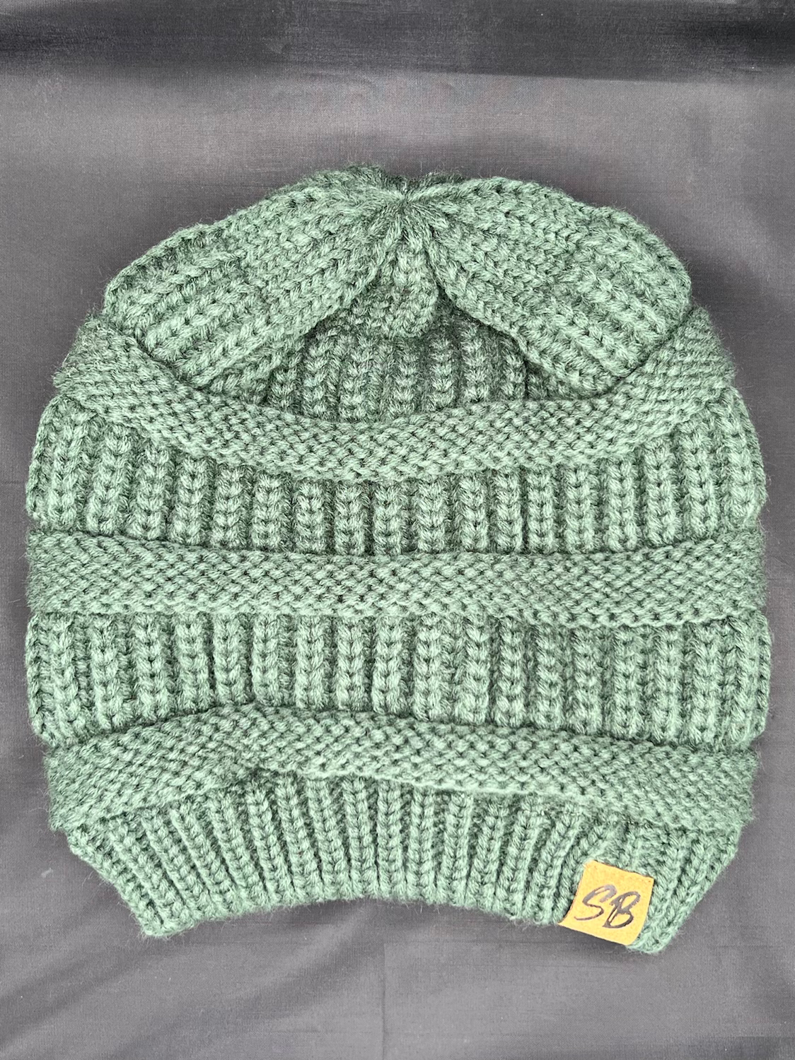 Olive silk lined beanie (royal member)