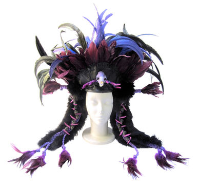 A hand-sewn purple and black feather and skull headdress made by Kat Ford.