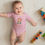 Thumbnail: Personalised Animal Letter P Infant Sleepsuit with custom name & date Pink