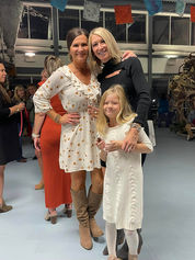 women and girl at event